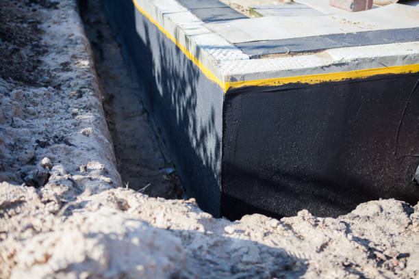 Professional Waterproofing technician working in Wheaton, MN